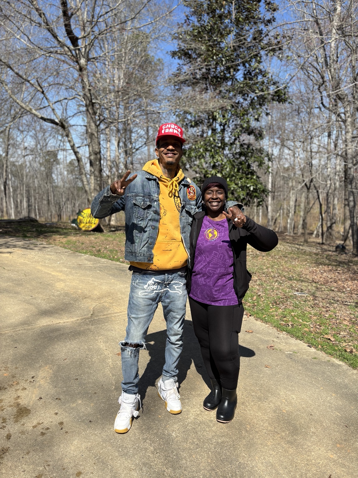 Tyree Smith with City Councilwoman Angela Addison outdoors at CHACE